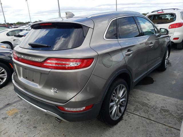 5LMCJ3C90GUJ21192 - 2016 LINCOLN MKC RESERV SILVER photo 4