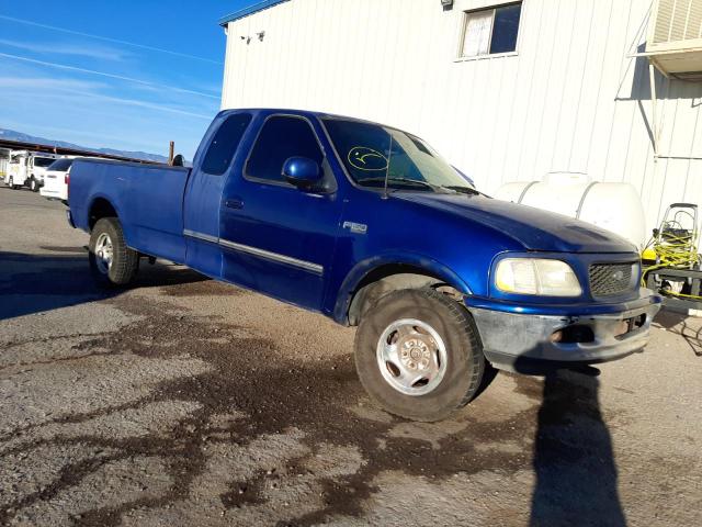 1FTDX1869VKB24291 - 1997 FORD F150 BLUE photo 1