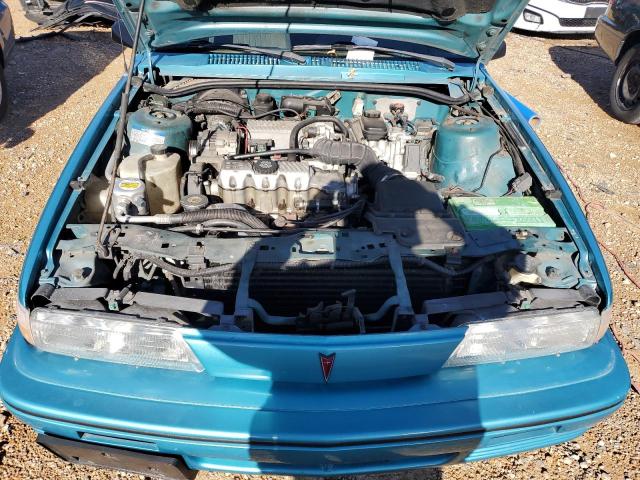 1G2JB54H3R7583510 - 1994 PONTIAC SUNBIRD LE TURQUOISE photo 7