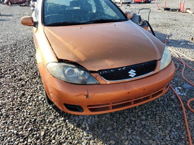 KL5JD66Z76K455688 - 2006 SUZUKI RENO ORANGE photo 9