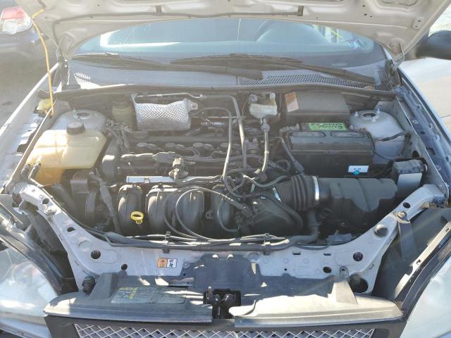 1FAFP34N95W110214 - 2005 FORD FOCUS ZX4  photo 7