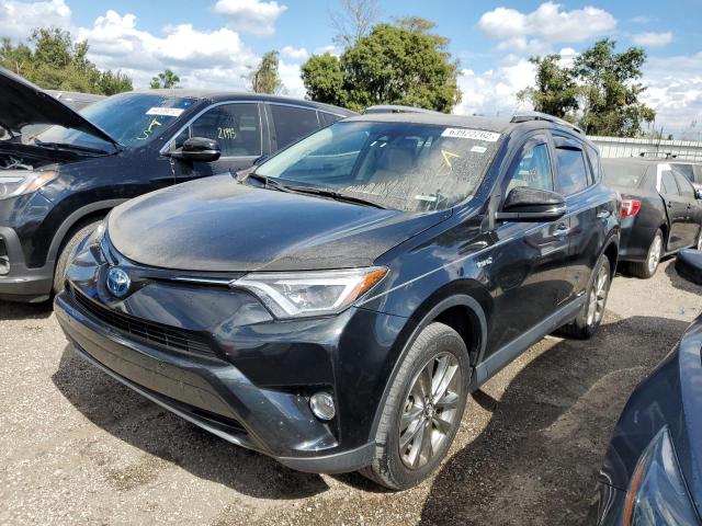 JTMDJREV9JD240357 - 2018 TOYOTA RAV4 HV LI BLACK photo 2