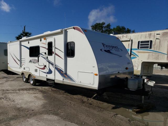 4YDT30027AT412659 - 2010 KEYSTONE PASSPORT WHITE photo 1