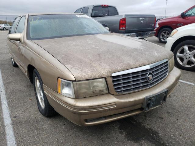 1G6KF5495XU716072 - 1999 CADILLAC DEVILLE TAN photo 1