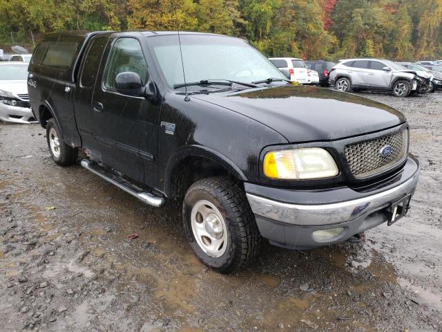 1FTRX18W22NB70643 - 2002 FORD F150 BLACK photo 1