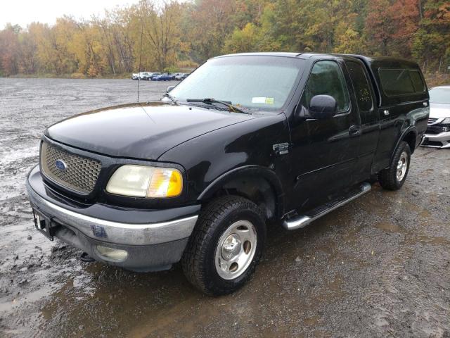 1FTRX18W22NB70643 - 2002 FORD F150 BLACK photo 2