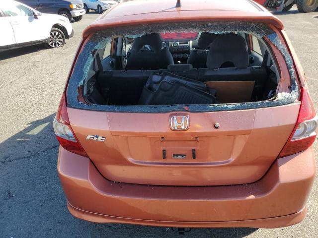 JHMGD37677S032911 - 2007 HONDA FIT S ORANGE photo 9