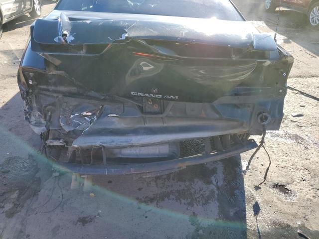 1G2NE12E7XM777515 - 1999 PONTIAC GRAND AM S BLACK photo 9