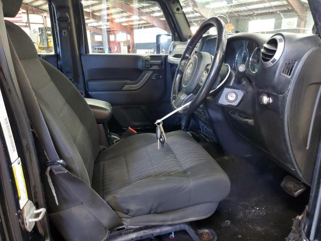 1C4BJWKGXCL261027 - 2012 JEEP WRANGLER U შავი ფოტო 5