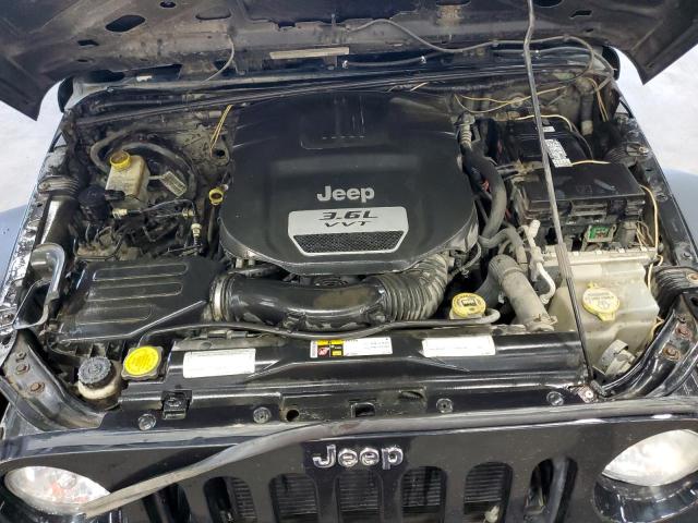 1C4BJWKGXCL261027 - 2012 JEEP WRANGLER U შავი ფოტო 7