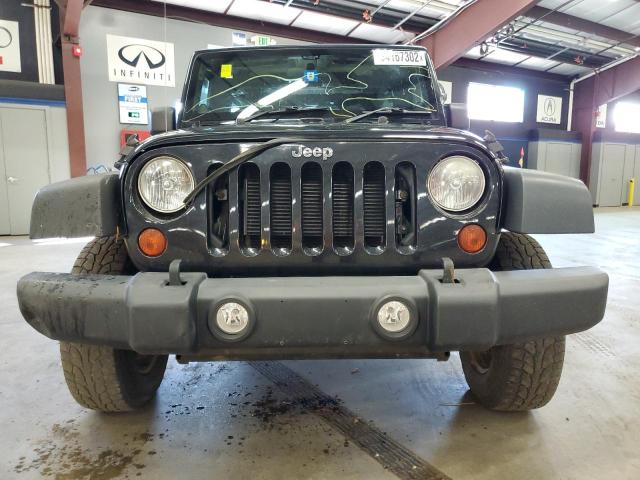 1C4BJWKGXCL261027 - 2012 JEEP WRANGLER U შავი ფოტო 9