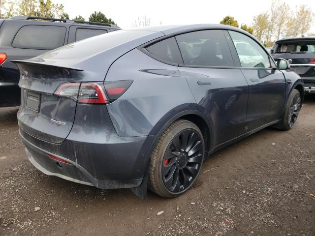 7SAYGDEF7NF507590 - 2022 TESLA MODEL Y GRAY photo 4