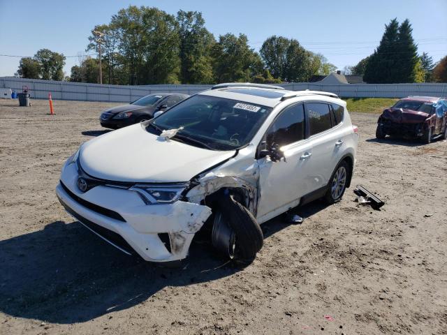 JTMDJREV8GD035864 - 2016 TOYOTA RAV4 HV LI WHITE photo 2