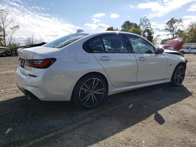 3MW5P9J04N8C23575 - 2022 BMW 330XE WHITE photo 4