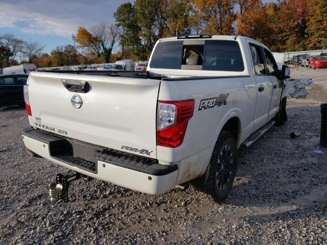 1N6BA1F47KN521080 - 2019 NISSAN TITAN XD S WHITE photo 4