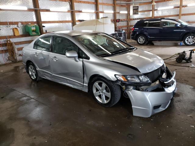 19XFA1F5XBE036031 - 2011 HONDA CIVIC LX SILVER photo 1