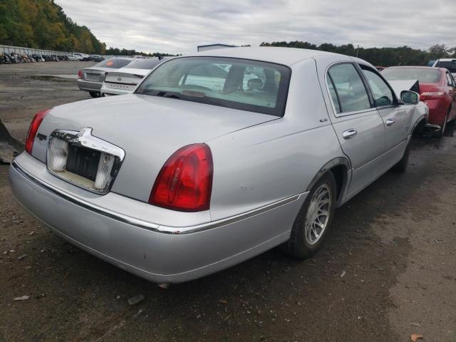 1LNHM82WX1Y625494 - 2001 LINCOLN TOWN CAR S SILVER photo 4