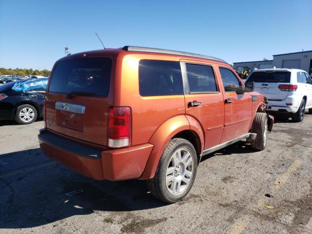 1D8GT58K68W127998 - 2008 DODGE NITRO SLT ORANGE photo 4