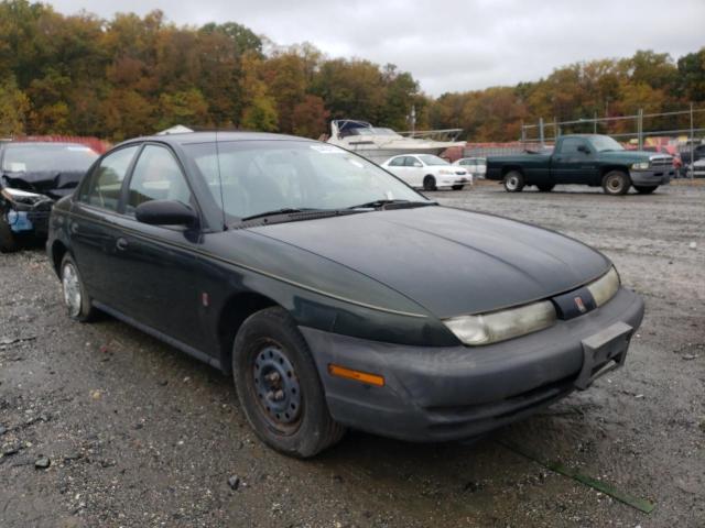 1G8ZH5284XZ337819 - 1999 SATURN SL1 GREEN photo 1