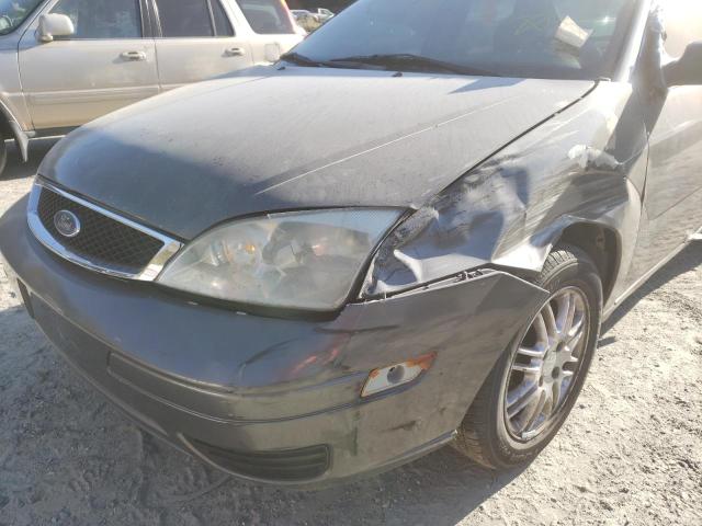 1FAFP34N07W236318 - 2007 FORD FOCUS ZX4 GRAY photo 9