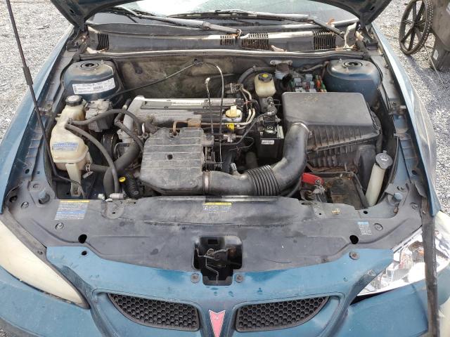 1G2NF52F32C227871 - 2002 PONTIAC GRAND AM S GREEN photo 7