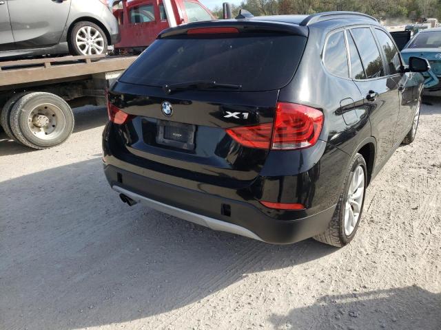 WBAVL1C5XEVY12309 - 2014 BMW X1 XDRIVE2 BLACK photo 4