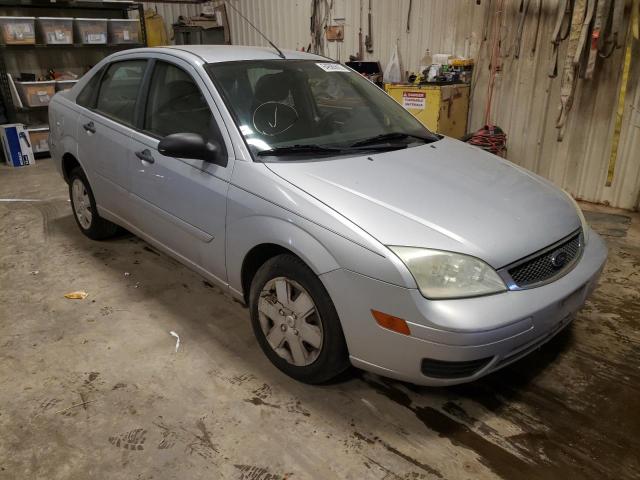 1FAFP34NX7W127445 - 2007 FORD FOCUS ZX4 SILVER photo 1