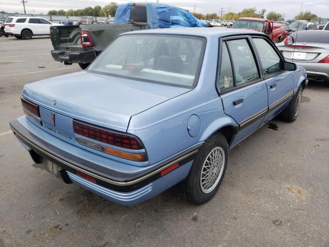 1G2JB54KXM7517041 - 1991 PONTIAC SUNBIRD LE BLUE photo 4