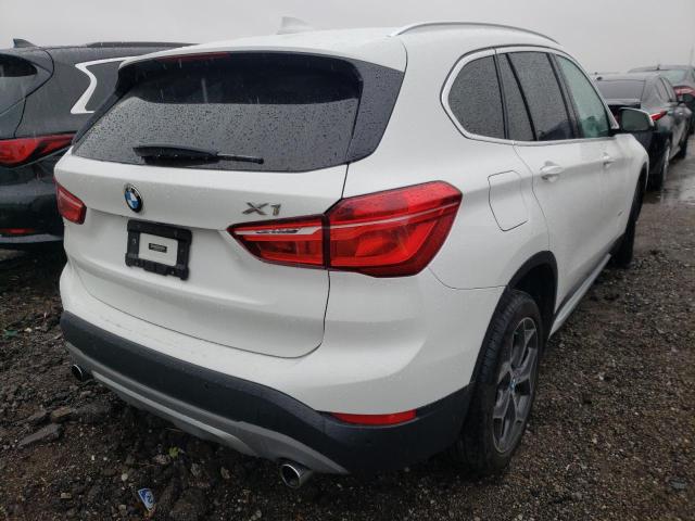 WBXHT3Z32H4A57190 - 2017 BMW X1 XDRIVE2 WHITE photo 4