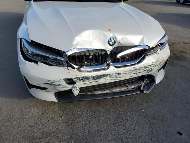 3MW5R1J02M8B71020 - 2021 BMW 330I WHITE photo 9