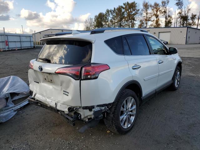 JTMDJREV9JD185067 - 2018 TOYOTA RAV4 HV LI WHITE photo 4