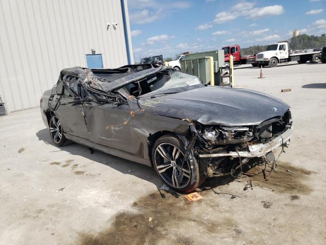WBA7F0C5XJGM23677 - 2018 BMW 750 I ნაცრისფერი ფოტო 1