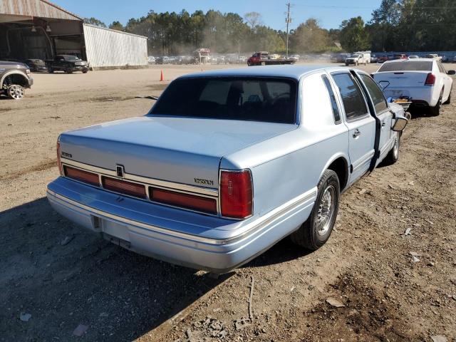 1LNLM82W8VY650409 - 1997 LINCOLN TOWN CAR S BLUE photo 4