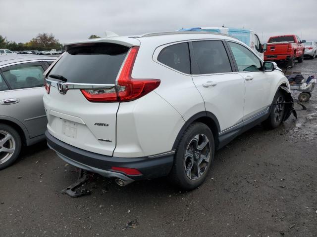 2HKRW2H98KH616829 - 2019 HONDA CR-V TOURI WHITE photo 4