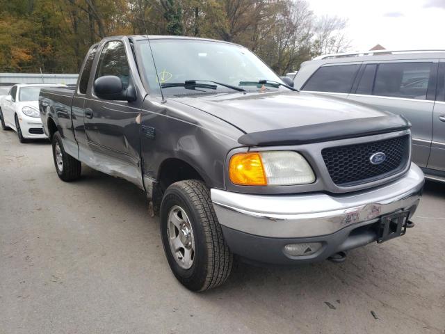 2FTRX18W54CA40526 - 2004 FORD F-150 HERI GRAY photo 1