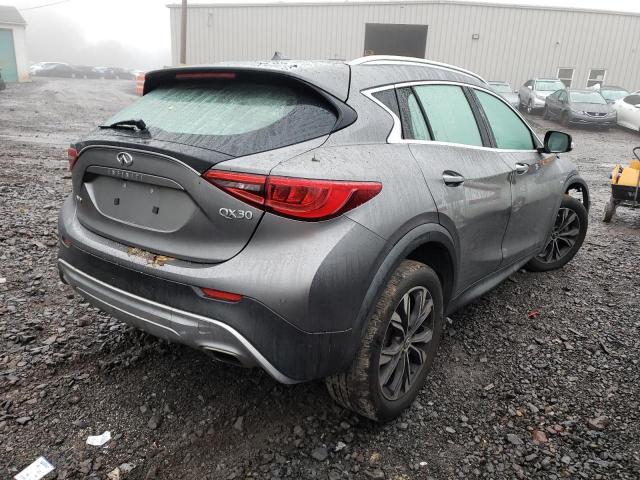 SJKCH5CRXJA060518 - 2018 INFINITI QX30 BASE GRAY photo 4