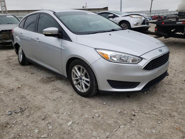 1FADP3F24FL217829 - 2015 FORD FOCUS SE SILVER photo 1