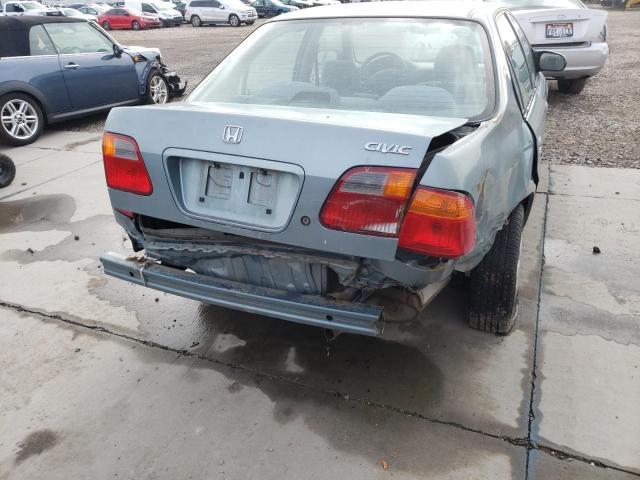 2HGEJ6613YH533216 - 2000 HONDA CIVIC BASE BLUE photo 9