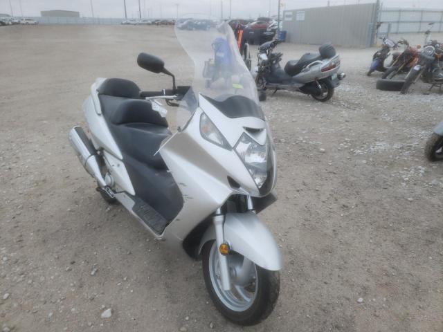 JH2PF01124K201047 - 2004 HONDA FSC600 D SILVER photo 1