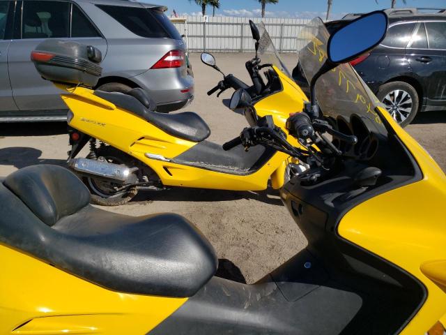 JH2MF06123K100911 - 2003 HONDA NSS250 YELLOW photo 5