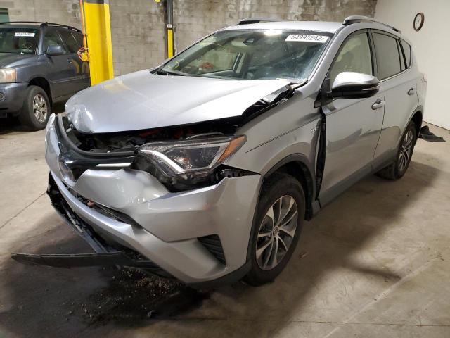 JTMRJREV7JD239049 - 2018 TOYOTA RAV4 HV LE SILVER photo 2