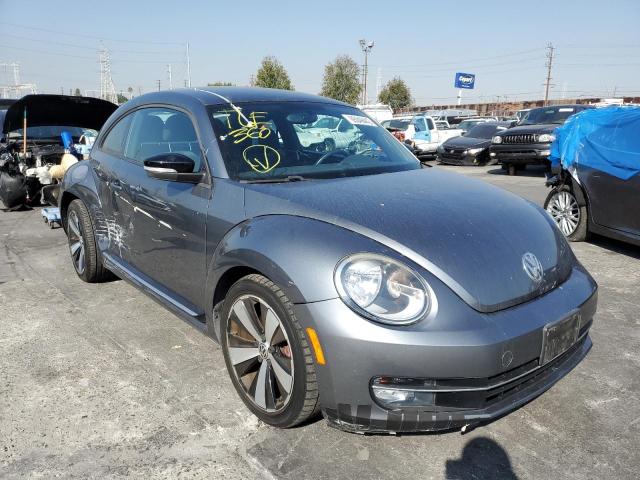 3VWVA7AT6CM618295 - 2012 VOLKSWAGEN BEETLE TUR GRAY photo 1