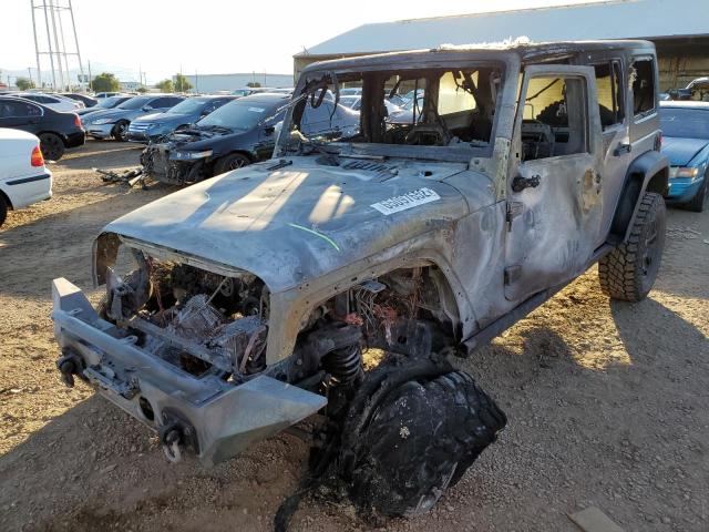 1C4BJWDG9GL235733 - 2016 JEEP WRANGLER U ვერცხლისფერი ფოტო 2