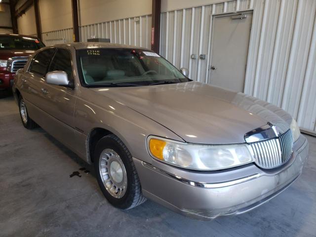 1LNHM81W4YY805632 - 2000 LINCOLN TOWN CAR E TAN photo 1