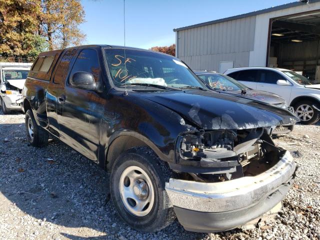1FTZX0724XKC10948 - 1999 FORD F150 BLACK photo 1