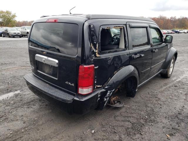 1D8GU58K27W650110 - 2007 DODGE NITRO SLT BLACK photo 4