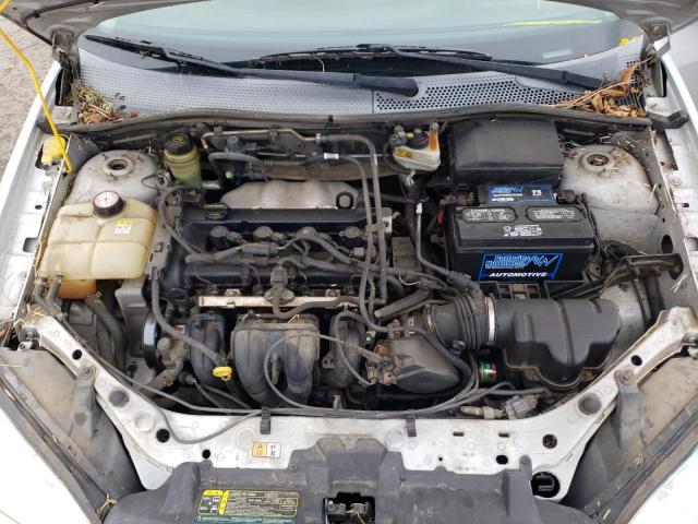 1FAFP34N55W192295 - 2005 FORD FOCUS ZX4 SILVER photo 7