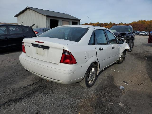 1FAFP34N47W279155 - 2007 FORD FOCUS 4D WHITE photo 4