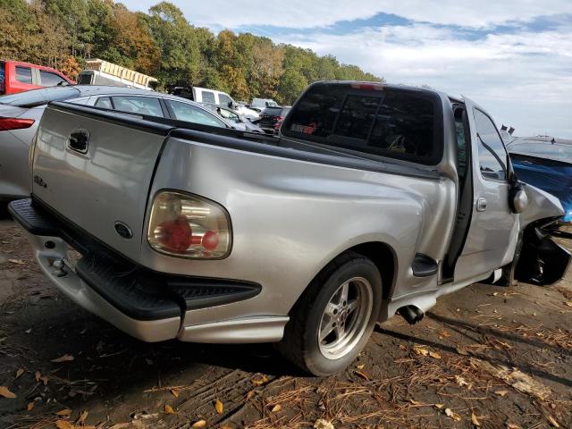 2FTZF0739YCB02309 - 2000 FORD F150 SVT L SILVER photo 4