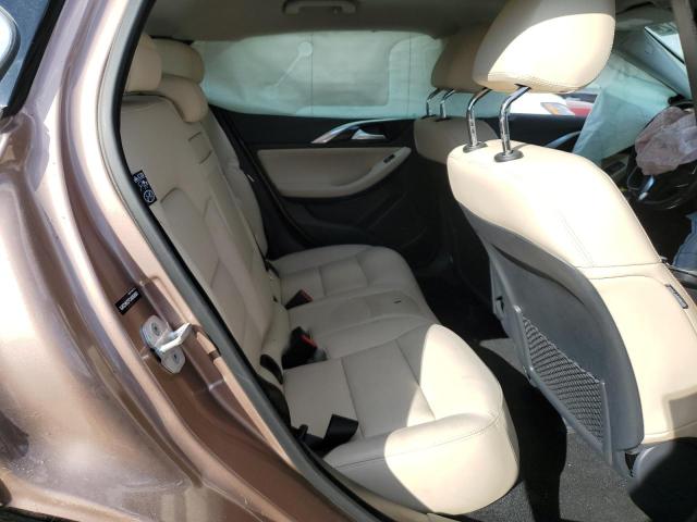 SJKCH5CP7JA059650 - 2018 INFINITI QX30 BASE TAN photo 6